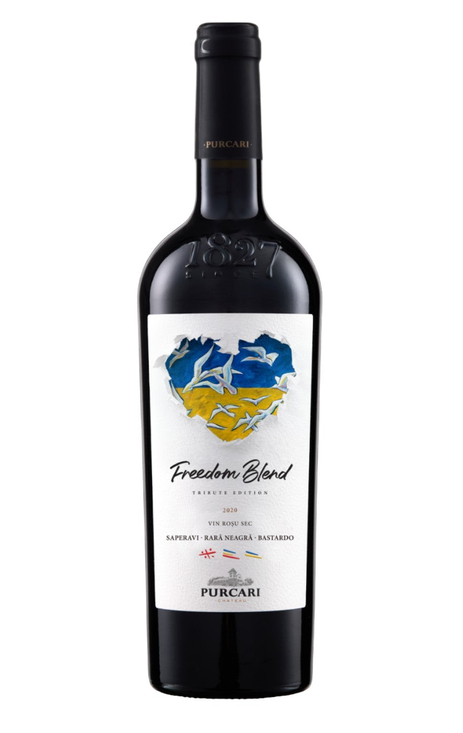 Bottle of Purcari Freedom Blend 2020 featuring a heart-shaped label with blue and yellow colors and white birds, representing a curated artisan wine with heritage grape varieties.